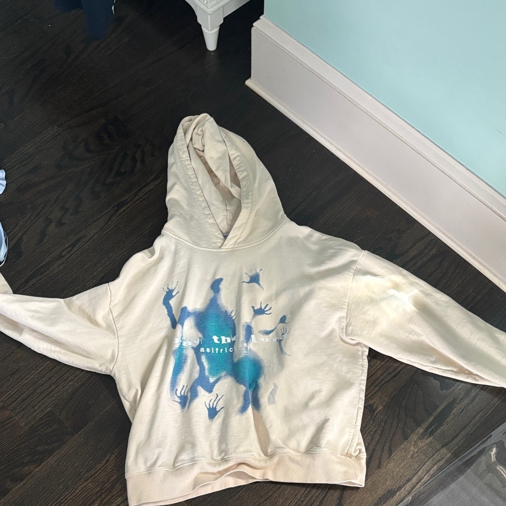 Women’s Cream Hoodie with Blue Graphic